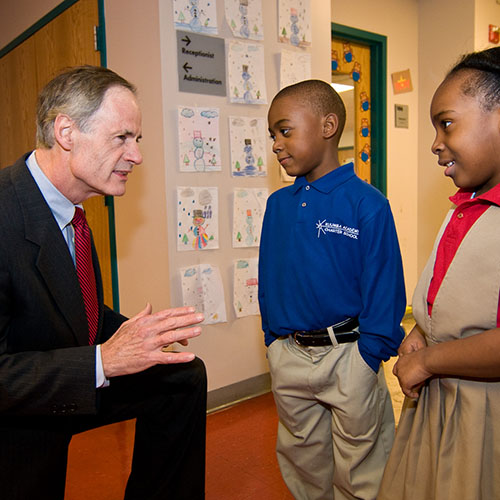 senator tom carper with children